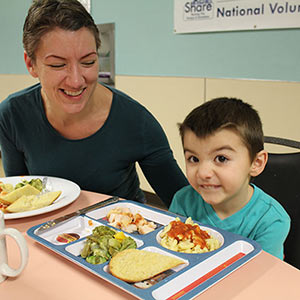 Mother and son sharing a meal