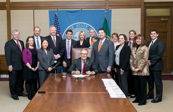 Gov. Jay Inslee and staff