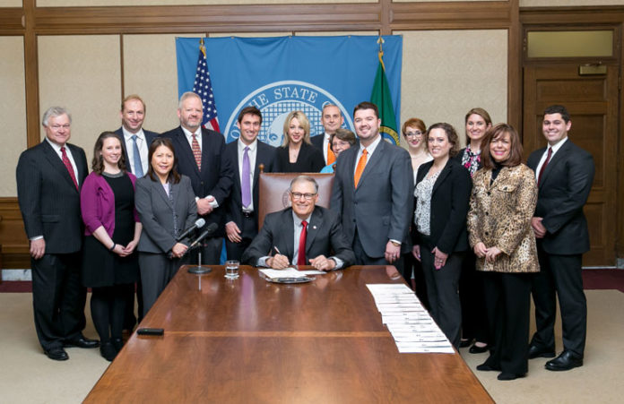 Gov. Jay Inslee and staff