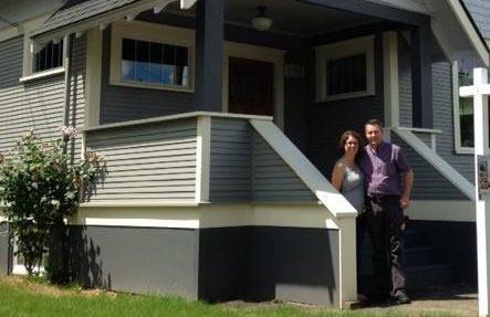 Couple standing on porch