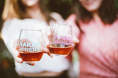 Two women holding wine glasses