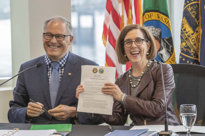 Signing I-5 replacement agreement