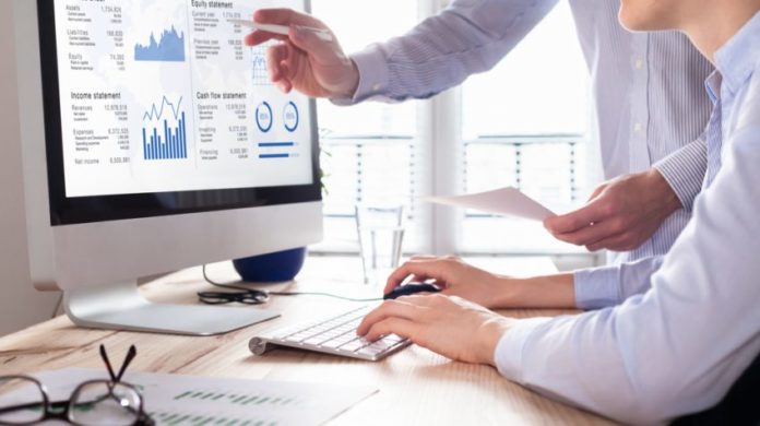 Businesses Two people working at computer