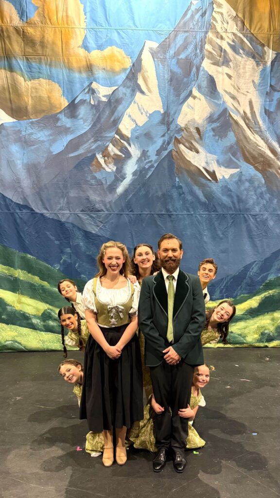 Creative poses in front of a mountainous backdrop