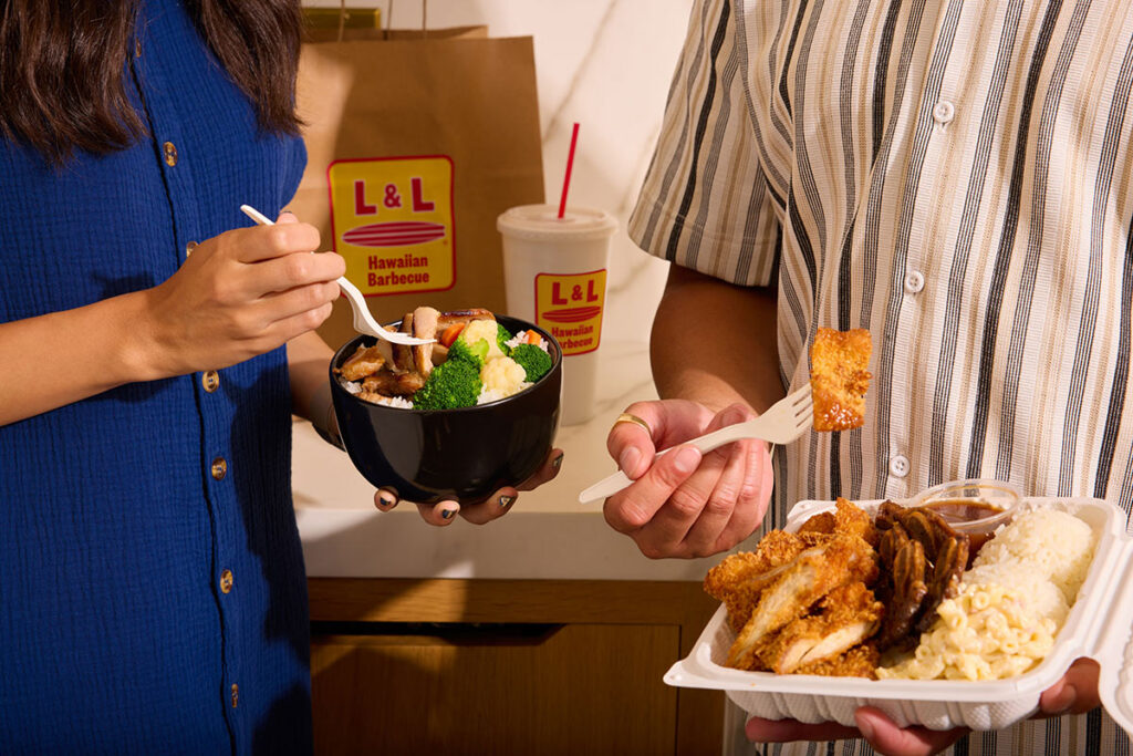 Man and Woman share a meal in close up.
