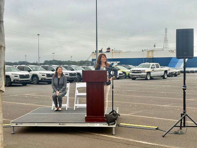 Speaking at the podium