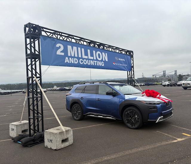 2 million and counting sign with Subaru